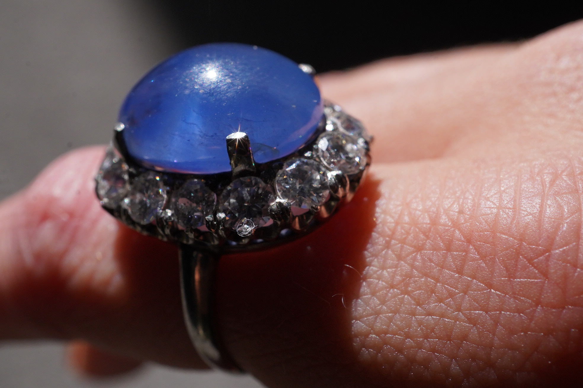 A sapphire and diamond ring, mid 20th century